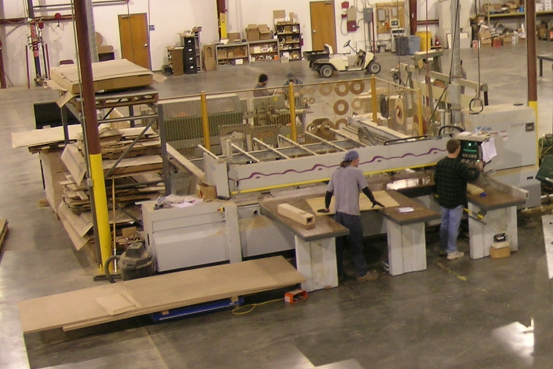 Holzma HPP-81 Beam Saw: This is a 12-1/2' beam saw capable of sawing multiple sheets (up to 5") of wood, metal, laminates, foam, hard wood or other sheets goods at one time. This saw also has scoring to make clean cuts in melamine and laminates.